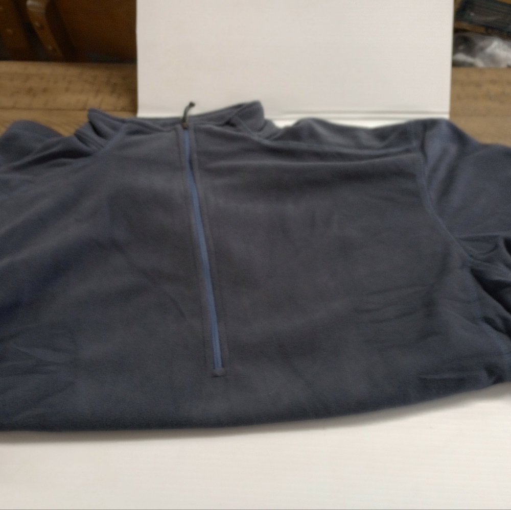 Men's quarter zip mock neck pullover micro fleece shirt.